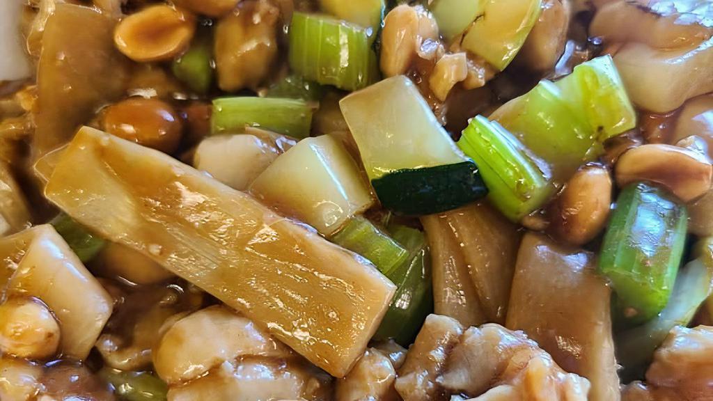 Kung Pao Chicken · Spicy. Dark meat chicken with celery, zucchini, water chestnut, bamboo shoot in spicy brown peanut sauce.
