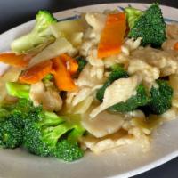 Chicken & Broccoli · Dark meat chicken with broccoli, carrot, bamboo shoot in brown sauce.