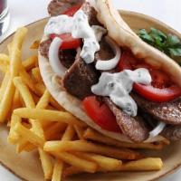 Gyro · Gyro with fries or rice, pita bread, and drink.