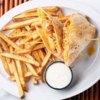 Buffalo Chicken Wrap · Crispy fried chicken tossed in your favorite wing sauce joined by fresh lettuce, shredded ch...