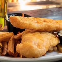 Blue Ribbon Fish ‘N Chips · A full pound of tender, flaky blue ribbon beer battered haddock served with Tavern fries, ho...