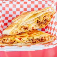 Hot Chicken Mac & Cheese Crunchwrap · Hot chicken, pimento mac and cheese, bacon, pickles, comeback sauce, wrapped in a toasted to...