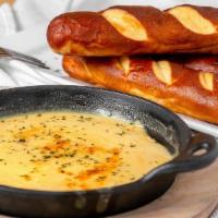 Soft Pretzels* · Bavarian Pretzels with House Made Beer Cheese Queso.