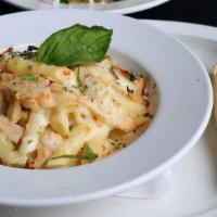 Chicken Alfredo · Baked Golden Brown and layered w/ melted Italian Cheese. Penne Pasta, Creamy Alfredo Sauce, ...