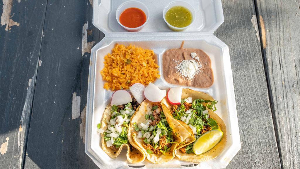 Taco Meal · Taqueria La Vaquita favorite: This meal includes three tacos with your meat of choice topped with cilantro and onions. On the side there is rice, beans, radish, and lime.