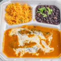 Chile Relleno · Chile poblano filled with chicken tinga , in red chipotle salsa, with cheese dip , served wi...
