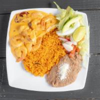 Camarones A La Crema · Jumbo shrimps is cooked with cream and chipotle sauce, serve with rice, beans and salad.