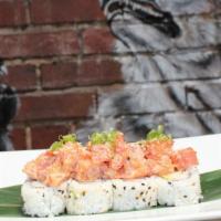 Wolfpack · Reverse style. Tuna, spicy mayo, masago, and scallions, served atop a Crunchy California rol...