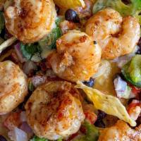 Shrimp Nachos · Gulf shrimp, marinated with a garlic and cilantro chimmichurri, seared on flat top