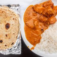 Butter Chicken · Served with rice and naan.