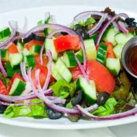 Anatolia Salad · Vegetarian. Chopped romaine lettuce, tomatoes, bell peppers, cucumbers, onions, black olives...