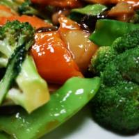 Garden Green · Mix vegetable with brown sauce.
Choose from Fried Tofu ,White Meat Chicken , Beef  or Shrimp