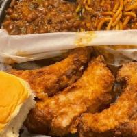 Deep Fried Ribs · Four baby back rib bones deep fried with or without batter. Served with baked beans, spaghet...