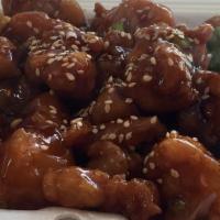 Sesame Chicken · Dark chicken meat specially prepared and blended with a mouth watering brown sauce. covered ...