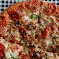 The Comiskey Thin Crust  (Extra Extra!) · Our “Triple Extra” Chicago Style Thin Crust is piled high with extra Italian sausage, extra ...