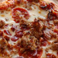 The Stockyard Thin Crust (Meat Lovers) · Our “Meat Lovers” Chicago Style Thin Crust comes loaded with Italian sausage, pepperoni, gro...