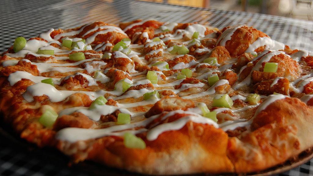 The O’Leary (Buffalo Pizza) · Our “Buffalo Chicken” Chicago Style Thin Crust come loaded with fried chicken, blue cheese and freshly sliced red onions, celery & banana peppers.  Topped with a ranch and buffalo sauce drizzle