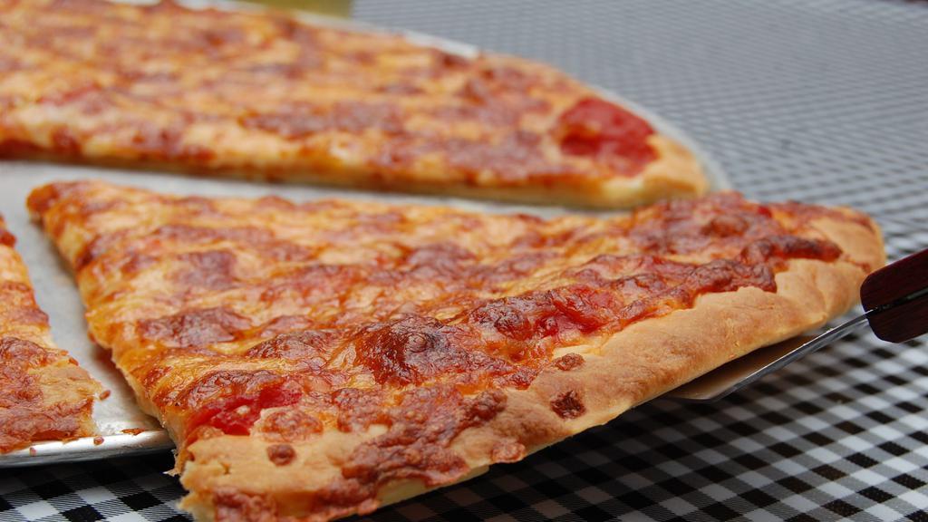 Ginormous Pizza Slice · Comes loaded with mozzarella cheese.  Add the toppings of your choice