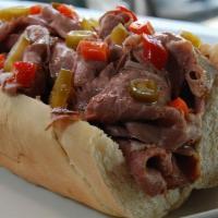 Chicago Style Italian Beef · Thinly sliced Vienna brand Italian beef piled high on a French roll.  Have it dry, dipped or...