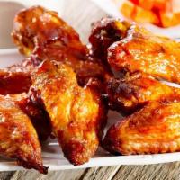 Big Ass Jumbo Chicken Wings · These wings have truly taken flight!  Served naked or with one of your favorite sauces.  Com...