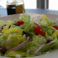 Greek Salad · Chopped romaine, feta cheese, black olives, banana peppers, cucumbers, cherry tomatoes, red ...