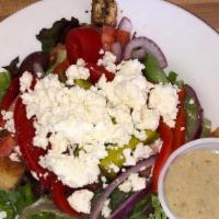 Greek Salad · Field greens, olives, red peppers, red onion, tomatoes, pepperoncini, feta cheese.