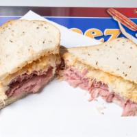 Bed Stuy · Top round corned beef, Swiss cheese sauerkraut and Russian dressing served on rye bread. Ava...