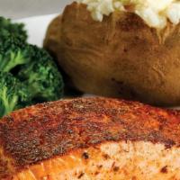 Grilled Salmon · Flaky, tender fillet- Cajun or Garlic-seasoned, or Teriyaki-glazed.  Served with two sides.