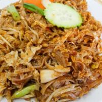 L-17. Pad Thai · Choice of chicken, pork, beef or tofu with stir-fried rice noodles, eggs, green onions in ta...