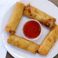 A-2. Fried Spring Rolls (4 Pieces) · Deep-fried wrapped shredded cabbage, carrots, and celery rolls served with pineapple sauce.