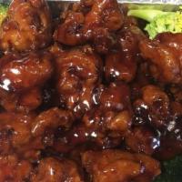 General Tso'S Chicken · Chunks of chicken filet quick-fried till crispy and sautéed  with hot pepper in a tangy sauce.