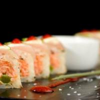 Margarita Roll* · Tuna, asparagus, and snow crab wrapped in soy paper topped with fresh yellowtail, thin slice...