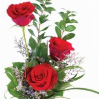 Three Fiery Roses Bud Vase · This darling bud vase is a sweet treat for your loved ones and is the perfect way to show yo...