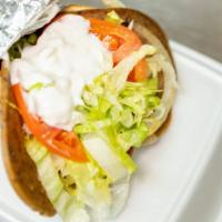 Chicken Gyro With Fries & Drink · Pita bread, grilled onions, lettuce, tomato, tzatziki sauce.