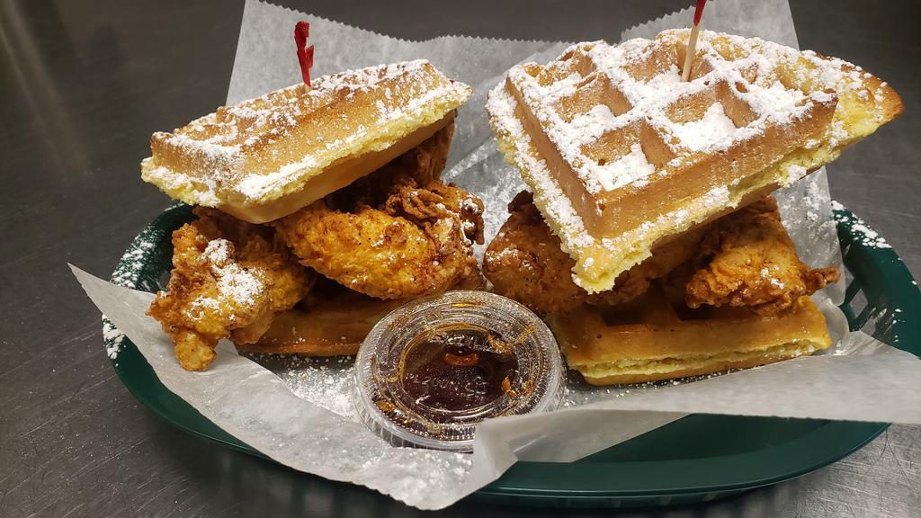 Chicken And Waffle Sliders · 4 Chicken Tenders Served on a Belgian Waffle with Powdered Sugar and Syrup