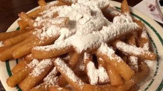 Beignet Fries · Topped with Powdered Sugar and Chocolate
