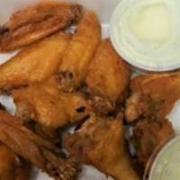 Buffalo Wings · A generous portion of our mouth watering wings. 10 pieces.