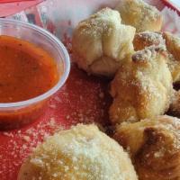 Garlic Knots · Made-from-scratch goodness and a family recipe! 8 pieces.