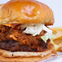 Carolina Burger · Specially blended beef, chili, Dixie slaw, onion, and mustard.