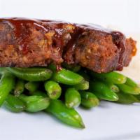 Meatloaf · Served with our special meatloaf sauce, mashed potatoes, and sautéed green beans.
