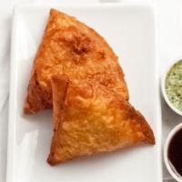 Samosa · Pastries stuffed with assortment of vegetables and potatoes.