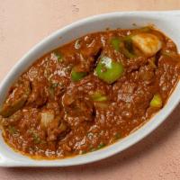 Kadai Lamb · Pieces of lamb cooked with onions, bell peppers, tomatoes, ginger and chef sauces.