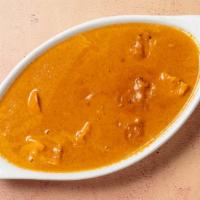 Chicken Tikka Masala · Boneless tandoori chicken cooked with tomato based creamy sauce.