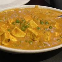 Mutter Paneer · Home-made Cottage cheese and green peas cooked in tomato and onion based sauce.