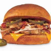 Kings Hawaiian Spicy Chicken & Cheddar Sandwich. · Pit-Smoked Marinated Chicken Breast with Cheddar Cheese, Signature Spicy Barbecue Sauce & Ja...