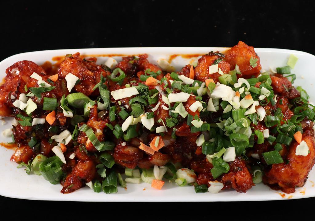 Gobi (Cauliflower Florets) Manchurian · Coated in a manchurian sauce made from scratch (ginger and garlic, soy sauce, chili sauces, and vinegar).