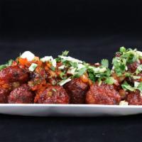 Vegetable Manchurian · Coated in a manchurian sauce made from scratch (ginger and garlic, soy sauce, chili sauces, ...