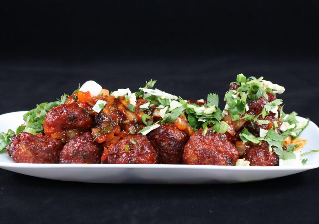 Vegetable Manchurian · Coated in a manchurian sauce made from scratch (ginger and garlic, soy sauce, chili sauces, and vinegar).
