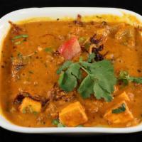 Kadai Paneer · Paneer (cottage cheese) cooked with bell peppers, tomatoes, and onion gravy.