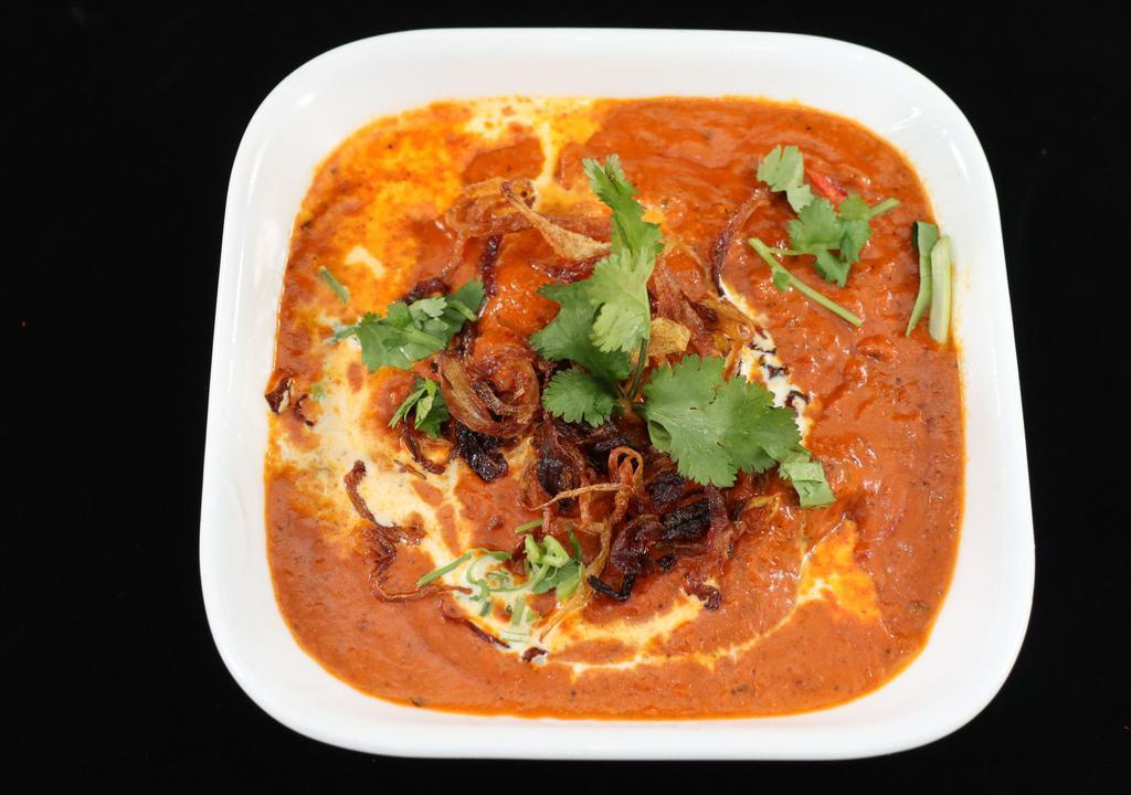 Chicken Butter Masala · Makhani is nothing but butter. Marinated chicken cooked in a mild curry base featuring butter.